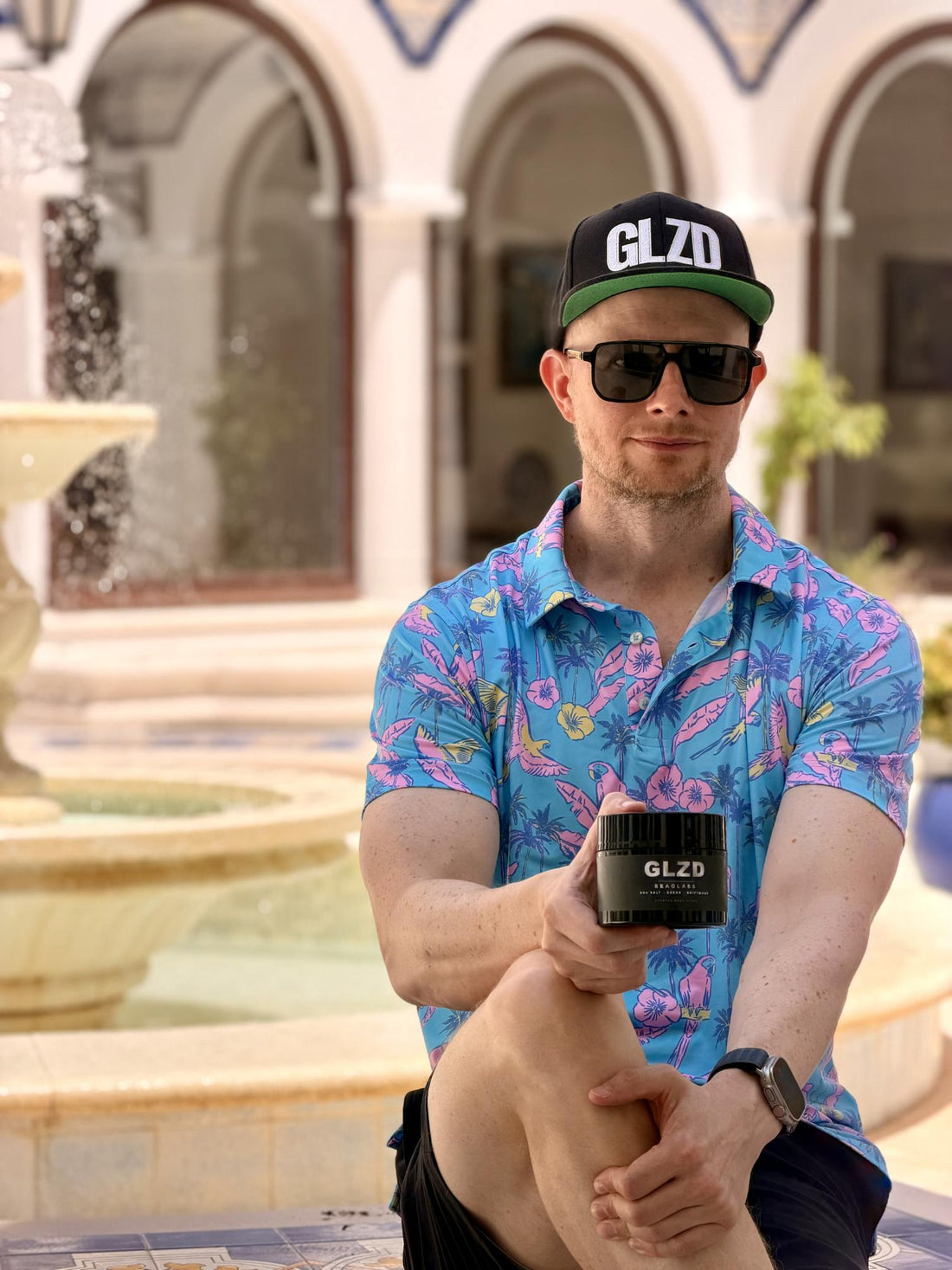 Mikey Moran holding GLZD body glaze